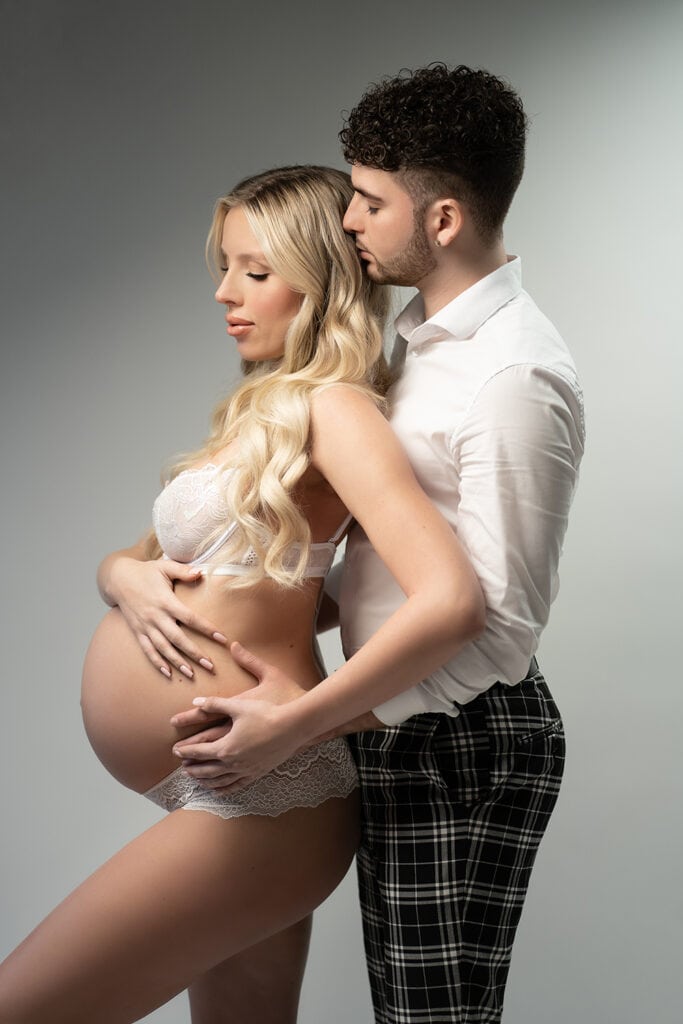 Man and Woman in maternity lingerie photo in San Clemente Studio.